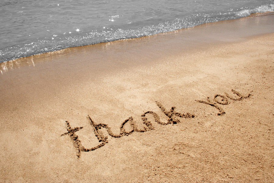 bigstock-Thank-you-handwritten-in-sand-19584086